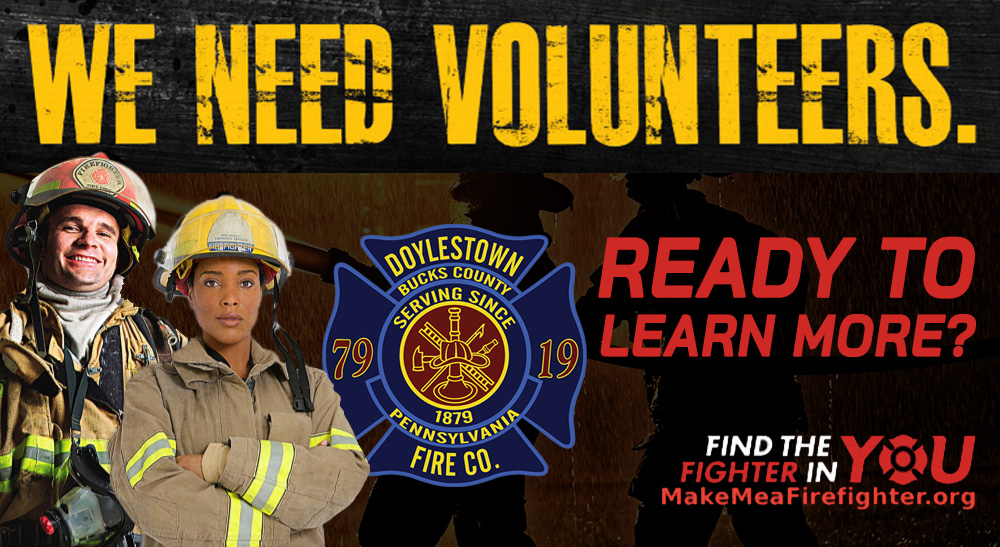 Two firefighters in gear stand confidently in front of the Doylestown Fire Co. logo. Bold text reads, "We Need Volunteers. Ready to Learn More? Find the fighter in you. MakeMeAFirefighter.org.